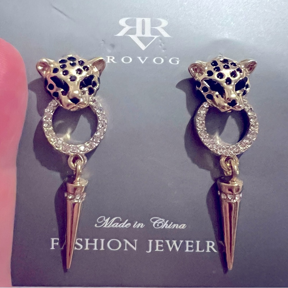 These are dangling sparkly leopard , kitty earrings, brand new